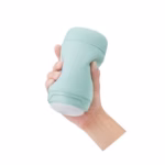 The best reusable masturbator Tenga Puffy Mint Green with a super soft spongy interior.